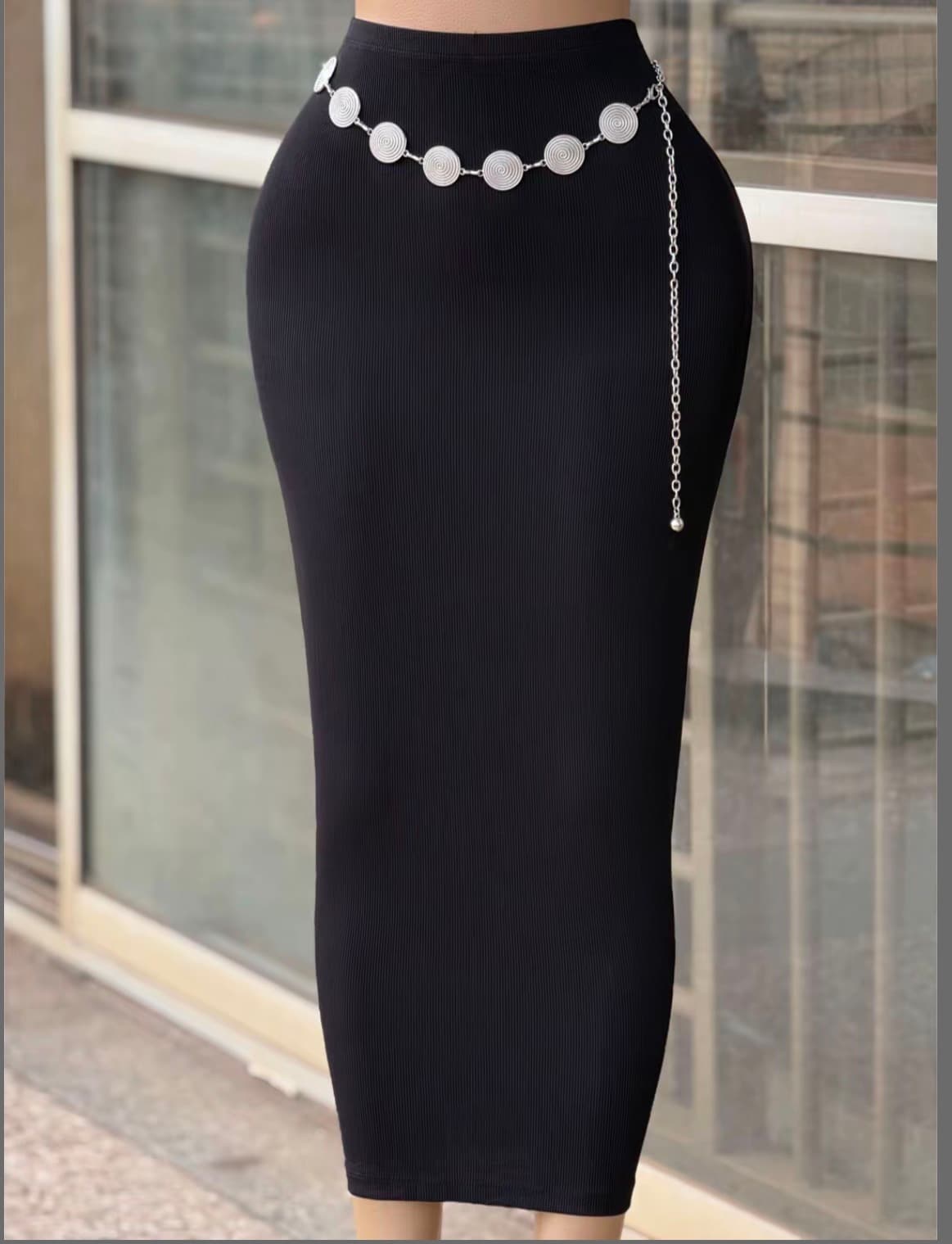 Black ribbed midi skirt with a silver chain belt
